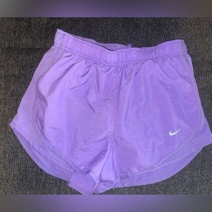 Purple Nike running shorts. Size small.